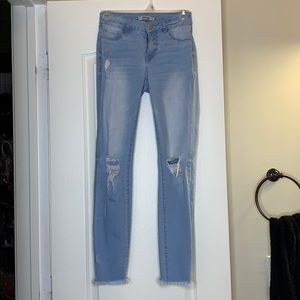 Size 0 ripped skinny jeans
